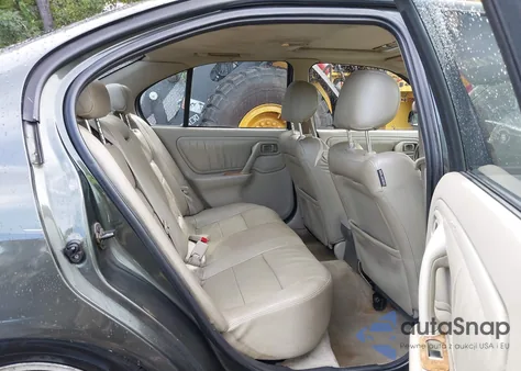 1999 Infiniti G20 Standard/Touring z USA, uszkodzony, nr VIN JNKCP11A9XT002407